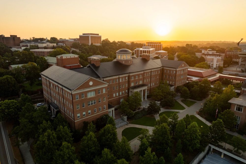 Aerial of the Miller Learning Center at sunrise on a summer morning.