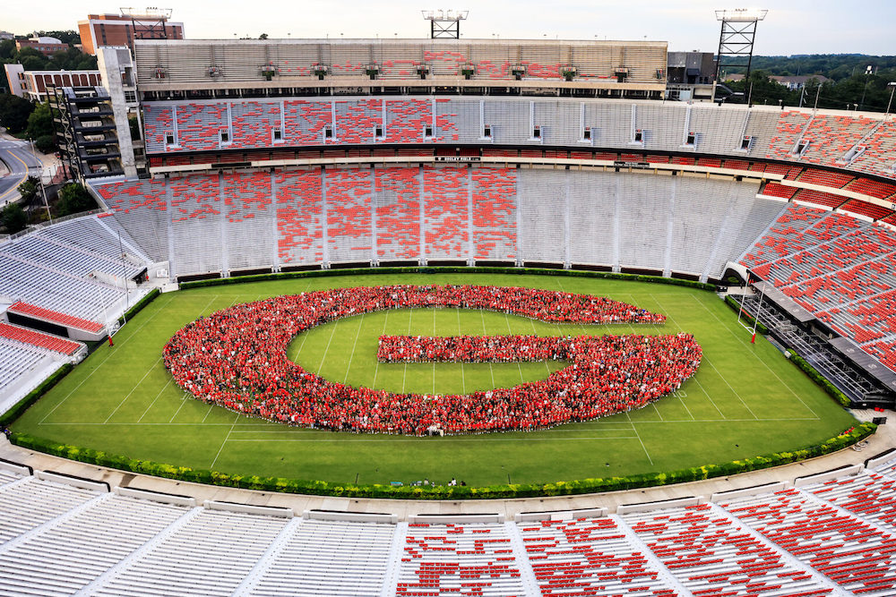 Incoming students in the Class of 2027 formed the “Power G” under the Sanford Stadium lights and between the hedges for Freshman Welcome.