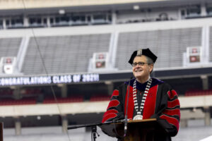 President Jere Morehead speaks at the podium.