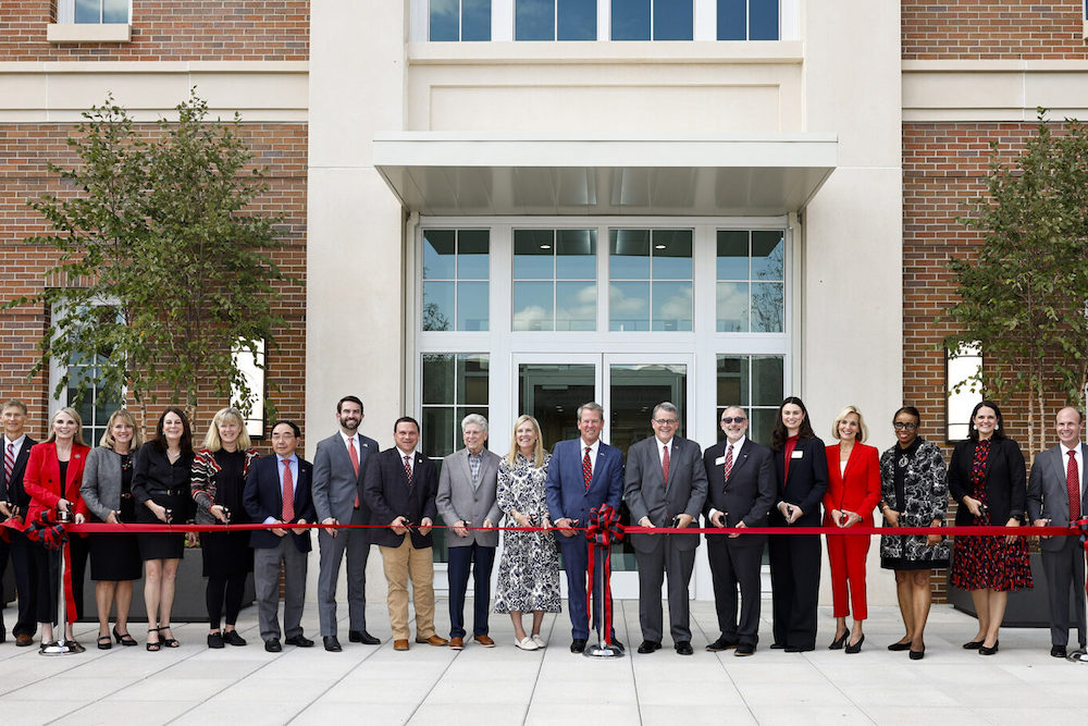 Gov. Brian Kemp and UGA President Jere W. Morehead,. middle, are joined by university and state dignitaries for the ribbon cutting of the Poultry Science Building. (Andrew Davis Tucker/UGA)