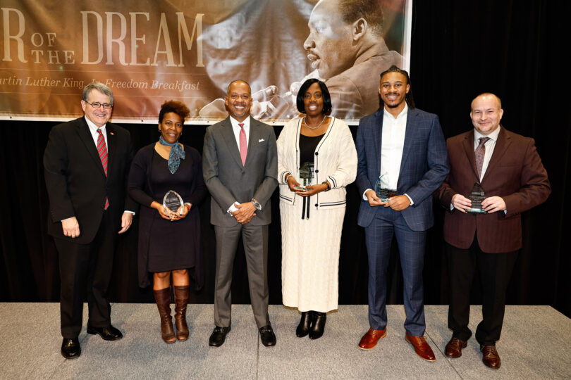 Shown, from left, are UGA President Jere W. Morehead with Andrea Dennis, the Dawn D. Bennett-Alexander Inclusive Community Award winner; keynote speaker T. Dallas Smith, founder and CEO of T. Dallas Smith & Company; and the 2024 President’s Fulfilling the Dream Award winners Terris Thomas, Caleb Snead and Brian Leffler. (Photo by Andrew Davis Tucker/UGA)
