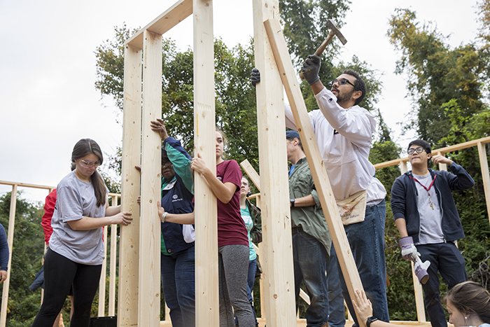 Students building a house